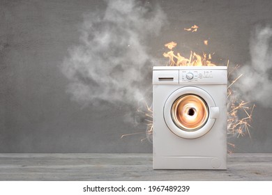 Broken Washing Machine With Smoke And Fire - Shutterstock ID 1967489239