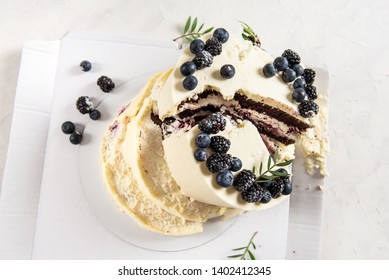 Broken Wedding Cake On White Background. Bad Birthday, Wedding. Spoiled Holiday. Bad Luck, Bad Delivery Concept.