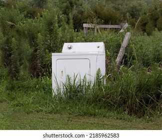 Broken White Washing Machine in Outdoor Studio Garage JunkYard  Abandoned Home Vintage Garden - Shutterstock ID 2185962583