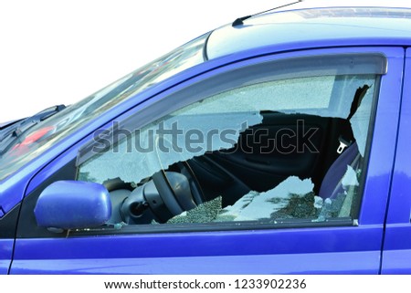 Broken window from driver's side. Attempt to steal bluecar  isolated on white background. criminal situation in russian city. 