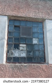 Broken Window Of An Old Abandoned Business