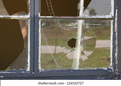 Broken Window At An Old House