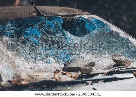 Broken windshield from a car accident. The windshield of the car was broken. Broken windproof car accident. Car accident. A window repair company will come to you to replace the broken glass