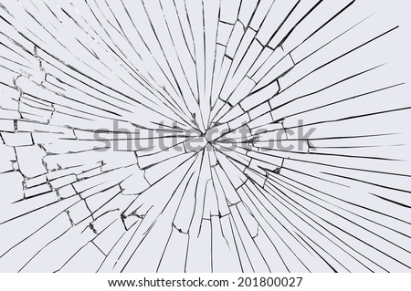 Broken windshield glass on a grayish background