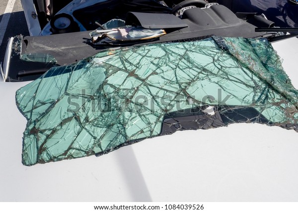 Broken windshield\
on the car after an\
accident