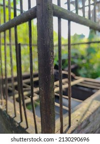 Broken Wooden Bars On A Worn Out Birdcage. Old, Rotten Wood
. Closest Selective Focus