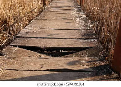 Broken Wooden Footbridge. Broken Board. Danger To Pedestrians.