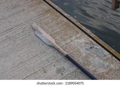 Broken Wooden Oar From A Boat.