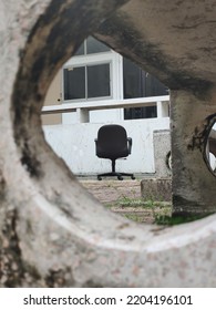 The Broken Work Chair Was Left Alone, In The Sun, In The Rain, But No One Paid Any Attention To It.