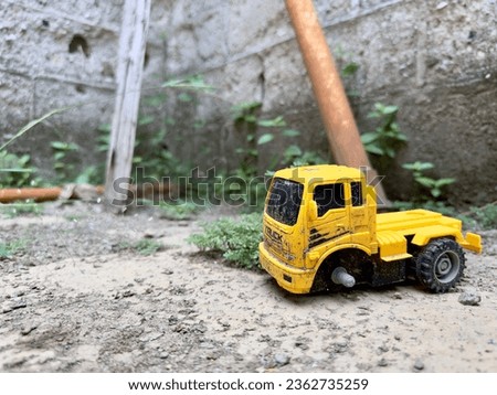 Broken Yellow Toy Truck in Backyards