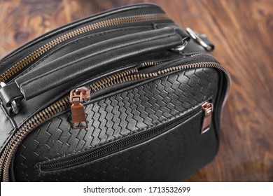 Broken Zipper On A Woman's Bag