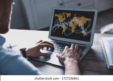 Broker Using Laptop At Table Indoors, Closeup. Forex Trading