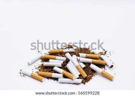 Brokern cigrettes and tobacco isolated on white background