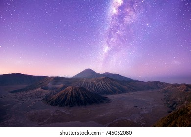 Bromo Tengger Semeru National Park,Surabaya,Indonesia In Morning. Sunrise Turn Into Red And Purple With Full Of Milky Way In The Sky. There Is A Big Great Amazing Nature Scene. Impressive Morning.