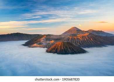 Bromo volcano mountain at sunrise in East Java, Indonesia surrounded by morning fog