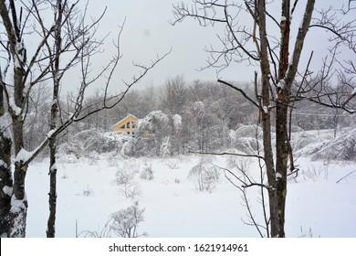 BROMONT QUEBEC CANADA 01 14 2020: Winter Landscape With And Old House After An Ice Storm  Eastern Townships Quebec Canada 