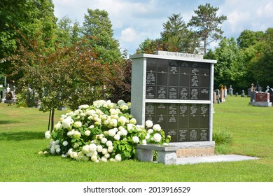 BROMONT QUEBEC CANADA 07 25 2021: Graves Of Roman Catholic Cemetery Bromont, La Haute-Yamaska Regional County Municipality, Quebec, Canada