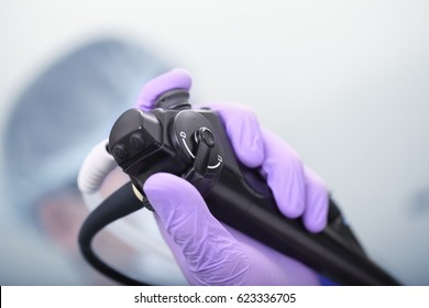 Bronchoscope in the doctor's hand during the procedure