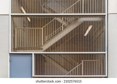 The Bronx, New York City, New York, USA. Stairway Seen Through A Metal Screen.