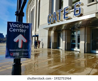 Bronx, New York, USA - March 9, 2021: Vaccine Center Sign Posted Outside The Yankee Stadium Mass Vaccination Site During The COVID-19 Pandemic