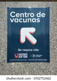 Bronx, New York, USA - March 9, 2021: Spanish Sign For Vaccine Center Outside The Yankee Stadium Mass Vaccination Site During The COVID-19 Pandemic