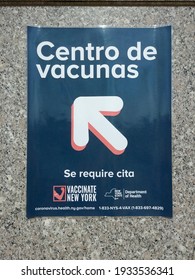 Bronx, New York, USA - March 9, 2021: A Spanish Sign For Vaccine Center Outside The Yankee Stadium Mass Vaccination Site During The COVID-19 Pandemic