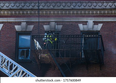 Bronx, New York/USA June 16, 2020 Fire Fighters Battle A 2 Alarm Blaze On The 4th Floor Of A 6 Story Residential Multiple Dwelling Building. 