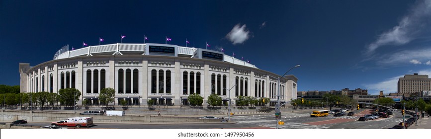 BRONX, NEW YORK/USA - May 21, 2019: Wide angle view of Yankee Stadium and nearby street. 