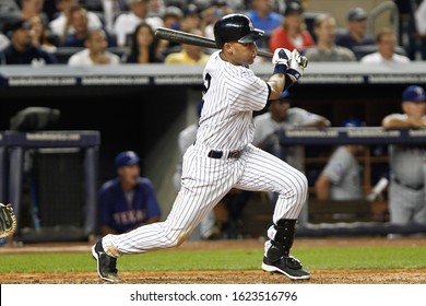 BRONX, NY - AUG 14: New York Yankees Shortstop Derek Jeter (2) Singles To Center Against The Texas Rangers During The Seventh Inning On August 14, 2012 At Yankee Stadium.