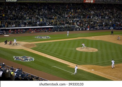 BRONX, NY - OCTOBER 17: Johnny Damon At Bat, Derek Jeter At First During Game 2 Of The ALSC At Yankee Stadium On October 17, 2009 In The Bronx.