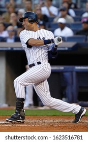 BRONX, NY - SEP 15: New York Yankees Shortstop Derek Jeter Hits An Rbi Single Against The Tampa Bay Rays On September 15, 2012 At Yankee Stadium. 