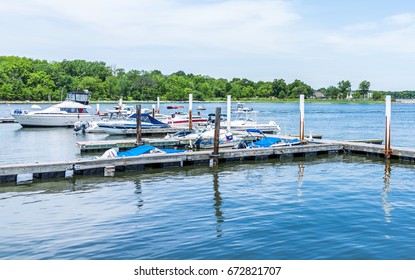 Bronx, NY USA - June 11, 2017 City Island harbor with boats and reflection