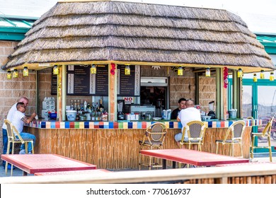 Bronx, USA - June 11, 2017: City Island Restaurant With Outdoor Picnic Table Seating Area And Tiki Bar