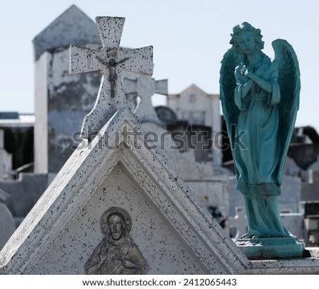 bronze angel statue in cemetery