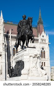The bronze equestrian statue of Count Gyula Andrassy in front of the building of Parliament in Budapest, Hungary