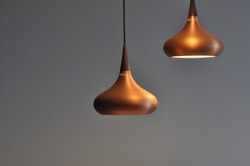 Bronze Hanging Dining Lights Combination With Cool Grey Background