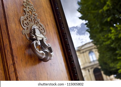 Bronze Knocker On The Door Of A Mansion In Bordeaux, France