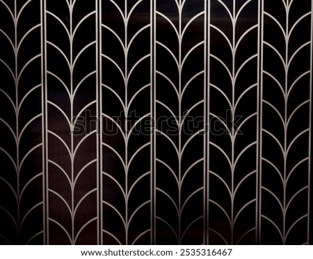 Bronze Leaf Pattern on a Black Metal Background.