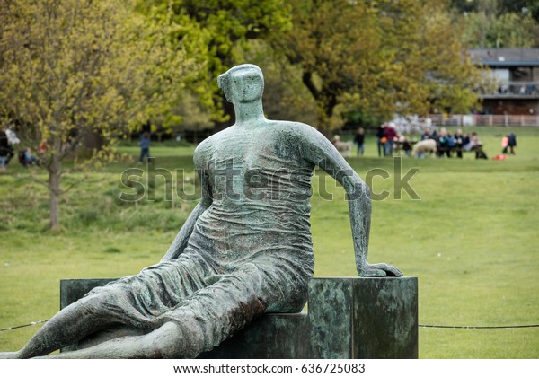 Bronze Sculpture Draped Seated Woman By Stock Photo Edit Now
