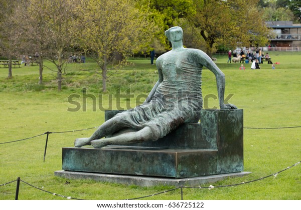 Bronze Sculpture Draped Seated Woman By Stock Photo Edit Now
