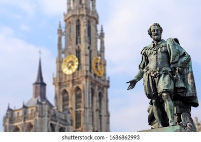 Bronze statue of the famous baroque Flemish painter Peter Paul Rubens with Cathedral of Our Lady in the back, in Antwerp, Flanders. Selective focus