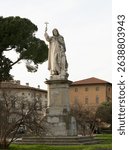 Bronze statue of Girolamo Savonarola by Enrico Pazzi in Piazza Savonarola, Florence, showing the friar in a dramatic pose.
