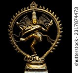 Bronze statue of indian hindu god Shiva (Nataraja) of Dancing form isolated on black background.Lord shiva is creator and destroyer.