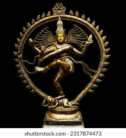 Bronze statue of indian hindu god Shiva (Nataraja) of Dancing form isolated on black background.Lord shiva is creator and destroyer.