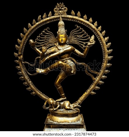 Bronze statue of indian hindu god Shiva (Nataraja) of Dancing form isolated on black background.Lord shiva is creator and destroyer.