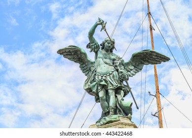 Bronze statue of Michael the Archangel, standing on top of the Castel Sant'Angelo, modelled in 1753 by Peter Anton von Verschaffelt.Picturesque sculpture on a background of clouds. Rome.Italy.Europe.