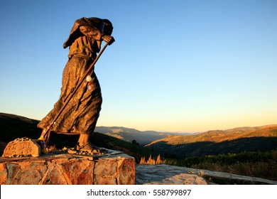 bronze statue of a pilgrim facing towards Santiago, Alto de San Roque, Spain