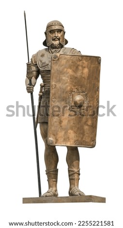 Bronze statuette of the Roman war greek Sparta type helmet roman warrior Warrior wearing iron helmet and warrior old metal shield. Ancient warrior isolated on white background. This has clipping path.