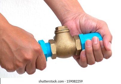 Bronze Swing Check Valve And Pvc Pipe Connection On Hands.