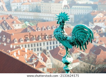 Bronze weathercock at the roof of St Vitus' Cathedral, Prague Castle